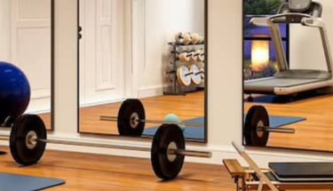 Guide To Large Gym Mirrors And How They Enhance Workout Spaces
