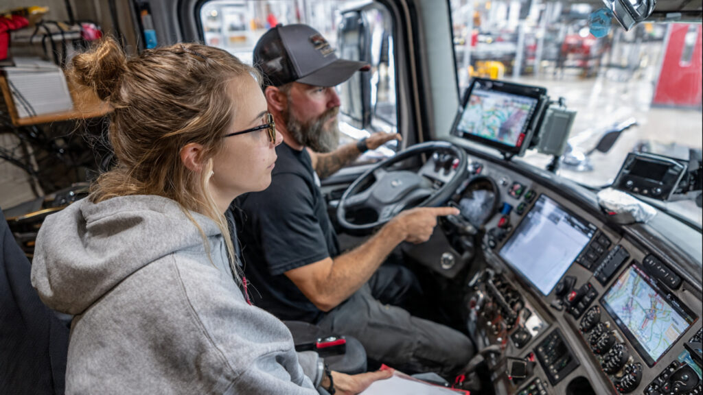 Cdl Training Grants Your Complete Guide Student learning about CDL training grants at a commercial driver training school in the United States.