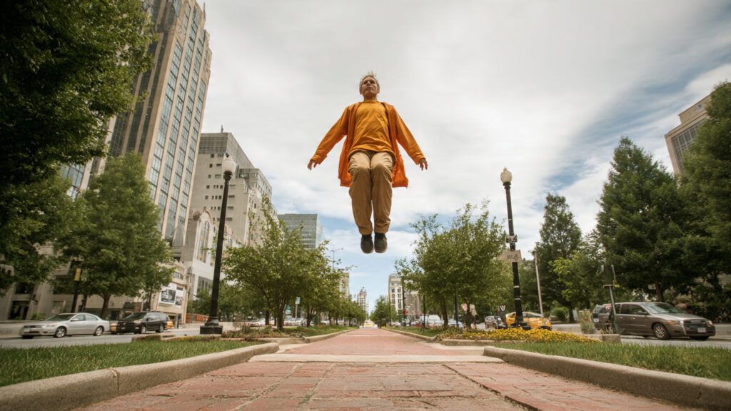 10 Bewildering Photos That Are Not Quite What They Seem The “Floating” Man Above the Street