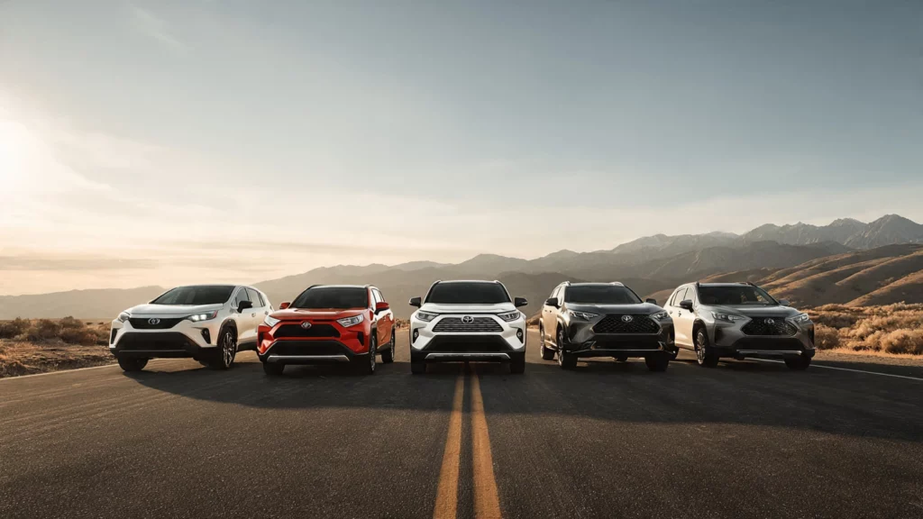 A lineup of long-lasting vehicles on an American highway: Toyota Corolla, Honda Accord, Toyota Highlander, Toyota Tacoma, and Lexus RX. 